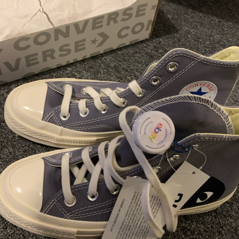 Grey CDG converse, never worn. Authenticity verified, women’s size 6.